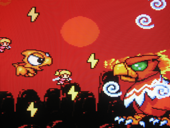 Against a stunning red sunset Coryoon battles a fearsome giant bird boss.