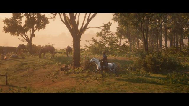 The screen is set in a rural landscape during sunset. It features a group of horses and cows grazing peacefully on the lush green grass. In the foreground, theres a small wooden cabin with a chimney from which smoke is billowing out. A man wearing a cowboy hat stands at the entrance of the cabin, overseeing the livestock. The sky transitions into a warm orange hue in the background, indicating that the sun is setting. There are no visible texts or user interfaces that provide context. The perspective suggests first-person viewpoint from inside the game environment.