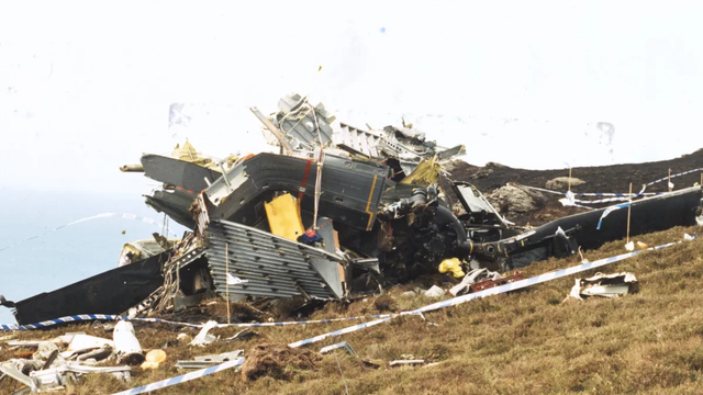 A photograph showing the wreckage of the aircraft on a Scottish hillside