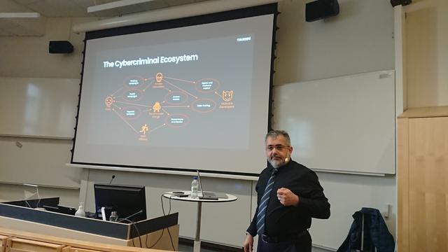 A lecture slide chart explaining the Cybercriminal ecosystem