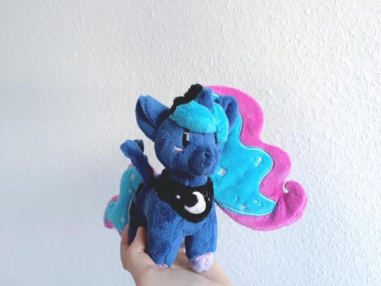 front view of a small plush of Luna from mlp