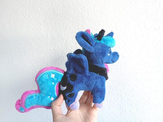 side view of a small plush of Luna from mlp