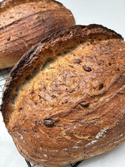 Seeded sourdough showing texture and gluten strands.