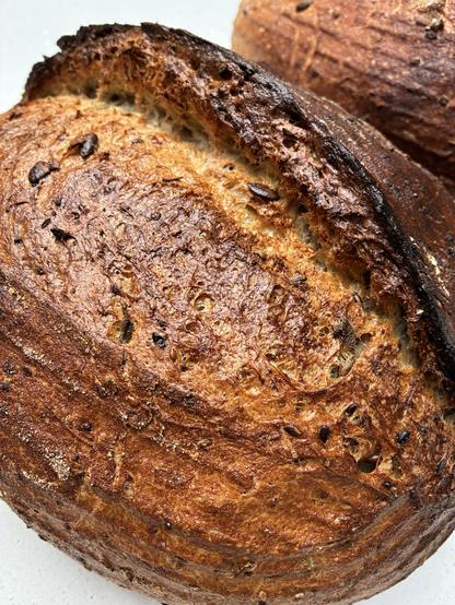 Seeded sourdough showing texture and gluten strands.
