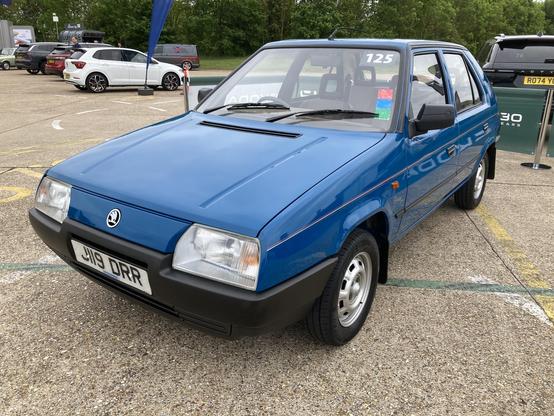 Blue Skoda Favorit, front quarter view