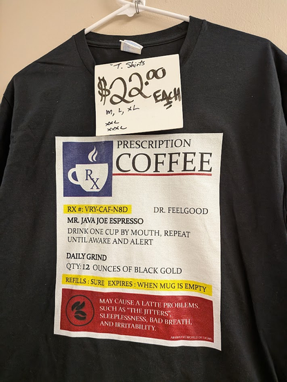 printed shirt with price tag $22.00 EACH

blue field with white cup labeled "RX"
PRESCRIPTION
_COFFEE_
