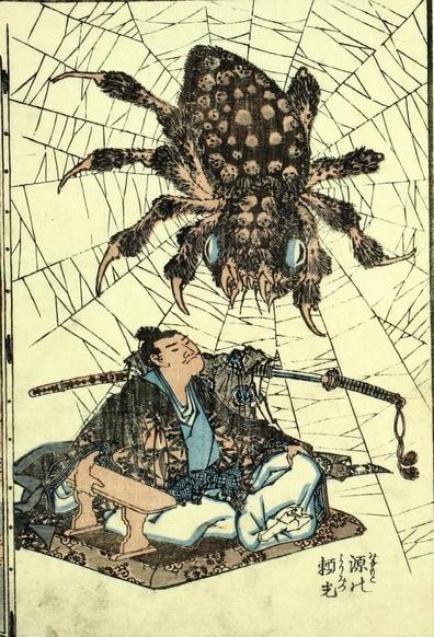 A man sits holding a sword and an enormous spider sits in a web above him.