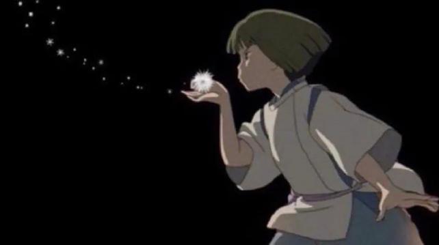 An image of a girl blowing a dandelion which results in sparkles