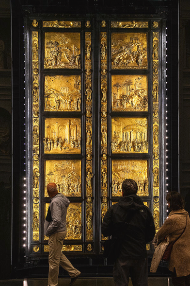 Golden Baptistery Doors Florence Italy

The Golden Baptistery Doors, also known as the Gates of Paradise, are a masterpiece of Renaissance art located on the eastern entrance of the Baptistery of San Giovanni in Florence, Italy. Crafted by the Florentine sculptor Lorenzo Ghiberti over a span of 27 years (1425–1452), these gilded bronze doors are celebrated for their intricate detail, dramatic storytelling, and revolutionary use of perspective.

Each of the ten large panels depicts a scene from the Old Testament, including iconic biblical stories such as the Creation of Adam and Eve, the Sacrifice of Isaac, and the Meeting of Solomon and the Queen of Sheba. Ghiberti’s innovative use of depth, architecture, and naturalistic figures marked a turning point in Western art and profoundly influenced later Renaissance artists, including Michelangelo, who famously dubbed them the “Gates of Paradise.”

The doors originally adorned the front entrance to the Baptistery but are now preserved in the Museo dell'Opera del Duomo for conservation purposes. Exact replicas currently stand in their place, continuing to awe visitors with their radiant beauty and historical significance.

A visit to Florence is incomplete without standing before these doors


https://fineartamerica.com/featured/golden-baptistery-doors-florence-italy-wayne-moran.html



#Florence #Italy #Golden #Baptistery #Doors #museum #travel #travelPhotography #Landscape #landscapes #art #fineart 

#ayearforart #buyintoart