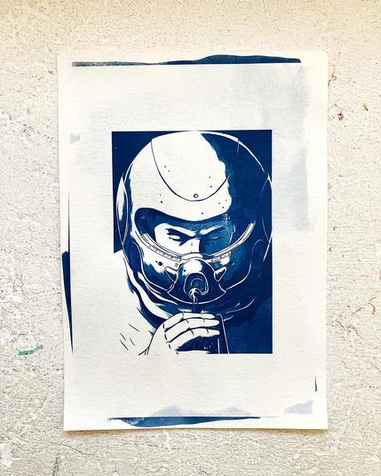 cianotype print showing an astronaut with a round helmet blowing a trumpet though a special valve/opening on the front.