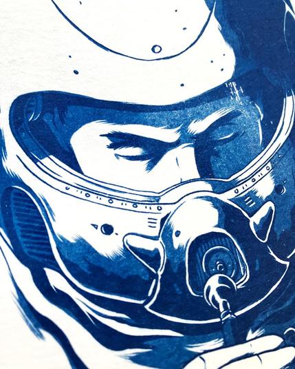 detail of a cianotype print showing an astronaut with a round helmet blowing a trumpet though a special valve/opening on the front.
