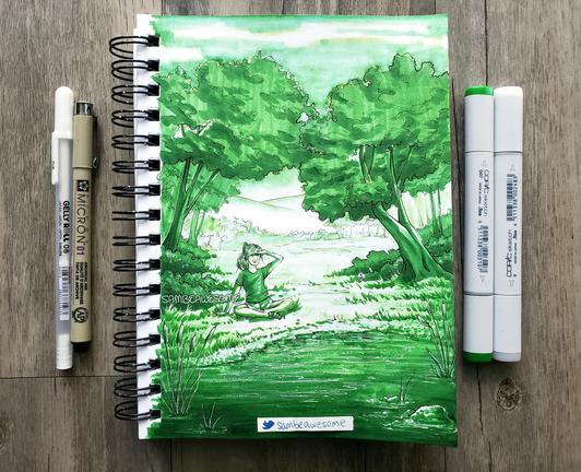 A photo of a sketchbook with an artwork of a girl sitting cross-legged in grass next to a pond with trees and bushes around her and far off distant trees and mountains. The entire artwork was colored only using one mid-tone green Copic marker.