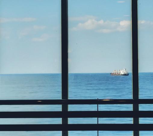 Ship visible in the middle panel of a North Sea ferry
