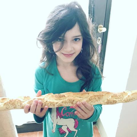 My daughter Liesl showing off her baguette