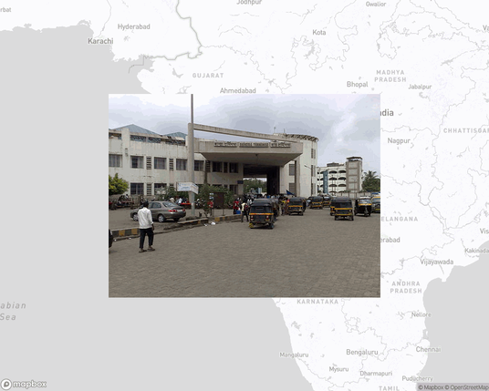 A photo of or from a train station from the linked website, overlaid on a cropped world map where it's located.