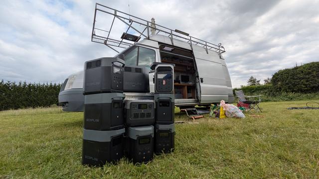 A stack of portable power stations next to Flossie, the Camb-Hams mobile shack