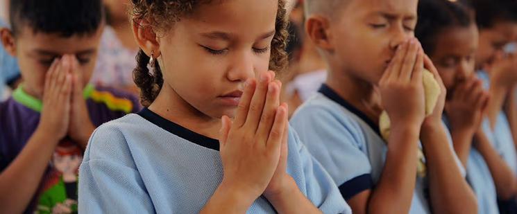 a group of participants of prayer.