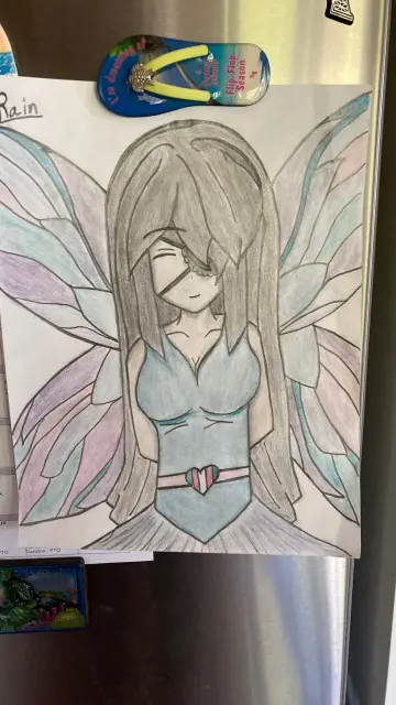 A drawing of my character as a fairy. I hung it up on my moms fridge like the good old days lol