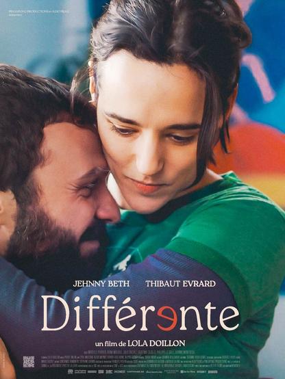 Affiche du film. Un homme barbu et une femme avec un haut vert et bleu sont enlacés. Ils sont en colère. Ou sarcastiques. Ou tristes. Ils émettent des expressions suite à des émotions.

Le titre du film a le second e verticalement retourné. Ou horizontalement. La lettre regarde en direction du début du mot.