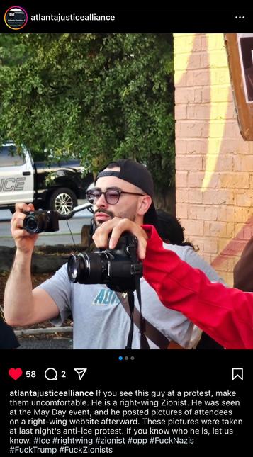 Man (identified as David Khait) holding camera.