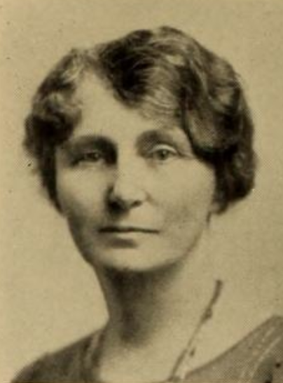 Louise Delpit, a white woman with wavy hair parted on the side and dressed close to her head