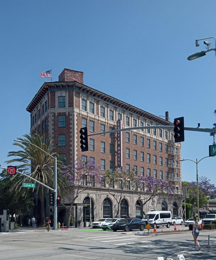 the impressive brick edifice of the Culver Hotel's flatiron building