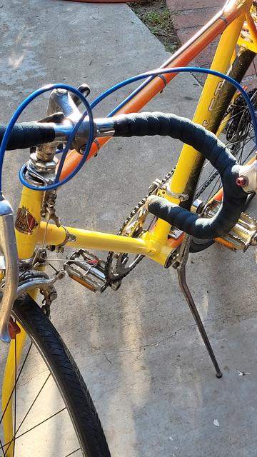 Another view of bike showing cable running from front