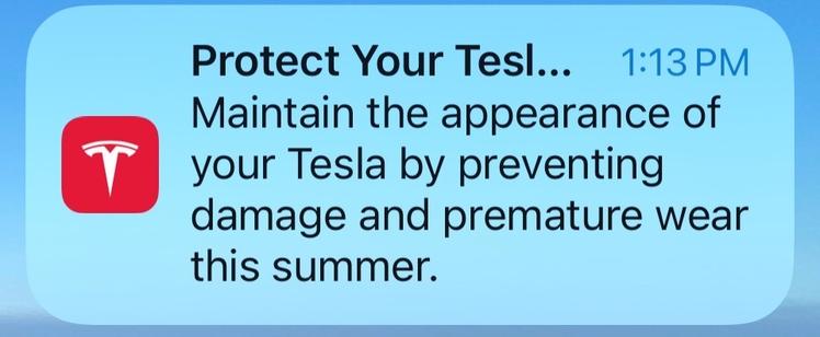 A push notification from Tesla titled “Protect your Tesla”, saying “Maintain the appearance of your Tesla by preventing damage and premature wear this summer.”
