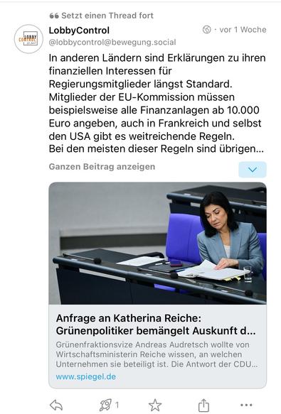 An image of a social media post discussing the financial interest declarations required for government officials in various countries. It includes a photo of a woman seated at a desk with papers, appearing to be in a formal setting, possibly a parliament. The post also mentions