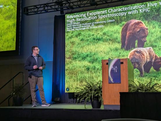 Dimitri Mawet stands on stage. Behind him is a giant screen with slides. They feature two bears, one slightly larger than the other.
Advancing Exoplanet Characterization: Five Years of High-Resolution Spectroscopy with KPIC by Dimitri Mawet
David Morrisroe Professor of Astronomy, Caltech 
Senior Research Scientist, JPL AAS 246, Anchorage AK, 12 June 2025
