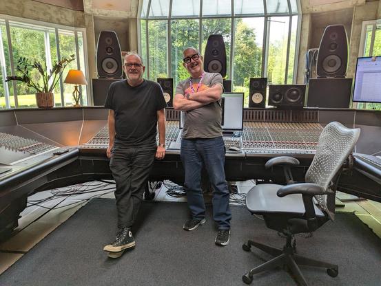 Portishead's Adrian Utley and yours truly standing in front of the main mixing console in The Big Room at Real World Studios, near Bath, England.