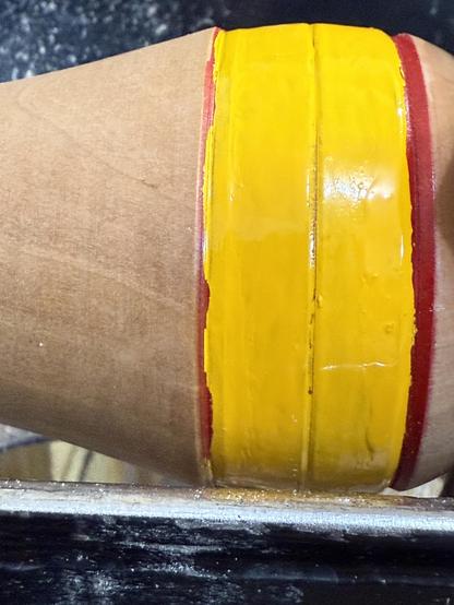 A painted band on the little vase I’m working on. The edges are decidedly ragged.