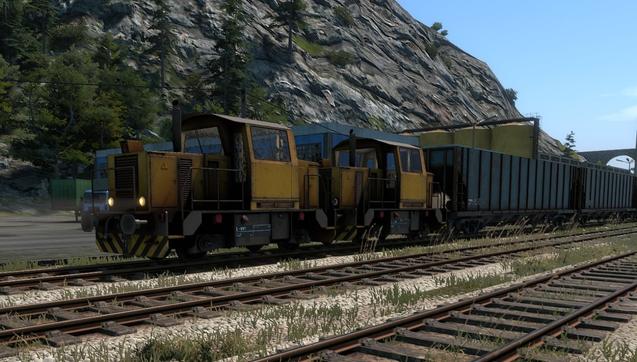 Derail Valley Simulator. I'm using two, DE2 locomotives to haul a consist of hopper cars.