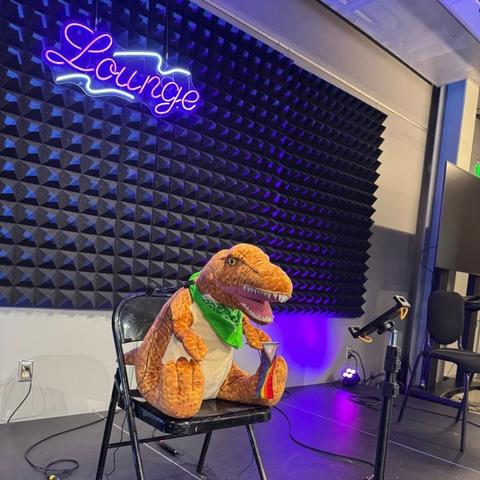 Dinosaur plushy takes the stage