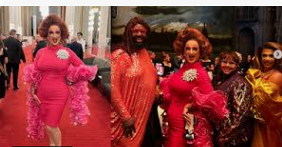 Drag queens -- dressed in pink with boas -- at Kennedy Center.