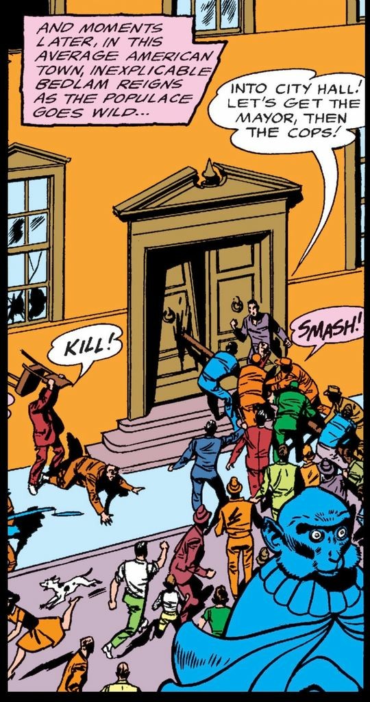 Silver Age panel. Outside of building a riot, a crowd of people rushing a front door while off to the side of the door a man is on his hands and knees on the sidewalk with another man behind him, holding a chair over his head with the attention of dropping it down on the man on the ground’s head, shouting,“KILL!” Narration: “And moments later, in the average American town, inexplicable bedlam rains as the populist goes wild….“ As a group of men use a wooden pole to ram open one side of a double door, another man stands by the entrance and says, “Into City Hall! Let’s get the mayor, then the cops!“