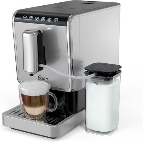 A modern oster coffee machine featuring a sleek design with a digital display. It has a cup underneath that contains a layered beverage topped with froth. A separate container for milk is attached to the machine, connected by a tube.
