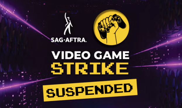 graphic in dark purple with bold white and yellow text that reads, 

"SAG-AFTRA
VIDEO GAME STRIKE
SUSPENDED" 

with the SAG-AFTRA logo and an upraised fist that's holding a video game controller.
