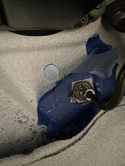 A new hole drilled into a restored Corvair