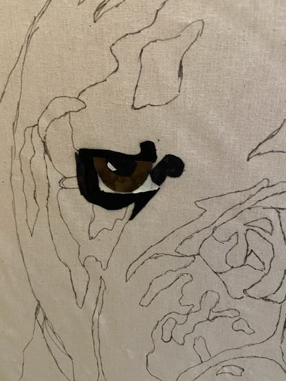 Close up of pattern on muslin of an English bulldog’s wye done with fabric