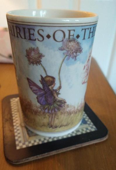 Flower Fairies mug of tea on a bedside cabinet