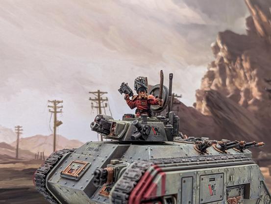 Chimera tank miniature in Vostroyan livery (green grey armour with gold accents)
