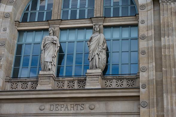 Gare du Nord detail showing closeup of two sculptures in the front façade
Paris