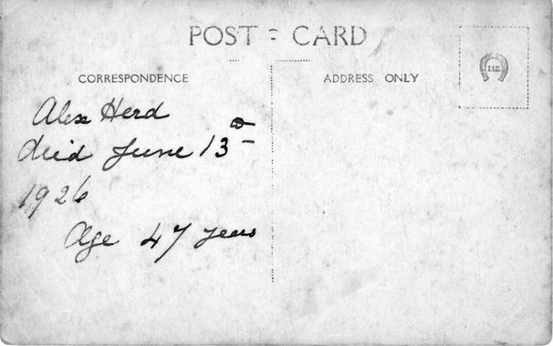 The reverse of the funeral carriage photograph postcard with the handwritten caption, "Alex Herd died June 13th 1926 age 47 years."