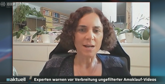 Screenshot aus dem Interview mit dem ORF, wo Frau Paganini auf einem Bürostuhl sitzend vor ihrem Bildschirm zu sehen ist.