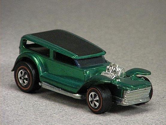 Released in 1970, Spectraflame Aqua Demon of 1970 Hot Wheels with Redline wheels. Notes: Roof painted black. Packaging: 1970 Blister. Metal Body, Metal Base. Made in Hong Kong. Scarcity: 3/10