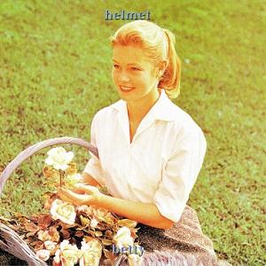 album cover of Betty by Helmet showing a young blonde girl sitting in a green field and handling a basket full of flowers