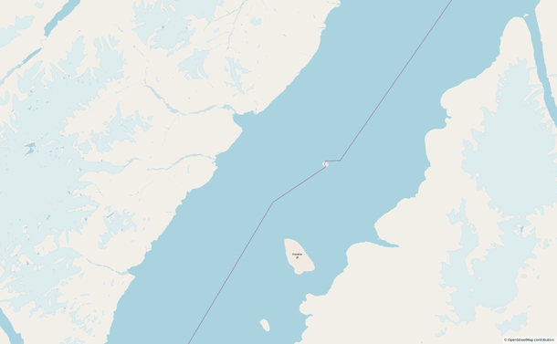 Map of parts of Ellesmere Island (left) and Greenland (right). The strait is about 40 km acress; it has a maritime border down the middle, which crosses a small island in the middle.