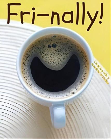 A photo of a Coffee Mug where bubbles from the froth form into a smile.