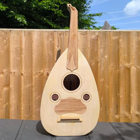 An oud almost complete, front view